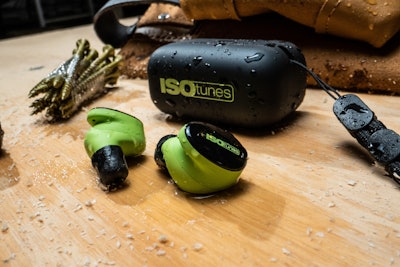 ISOTunes Free Aware earbuds on a workbench