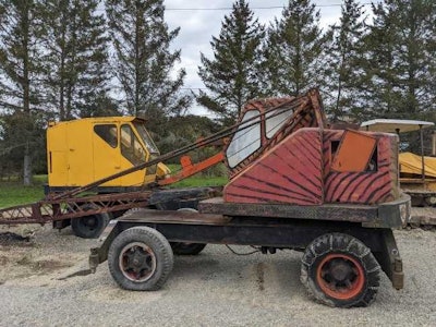 Bantam CR35 wagon crane wheeled sitting with antique equipment