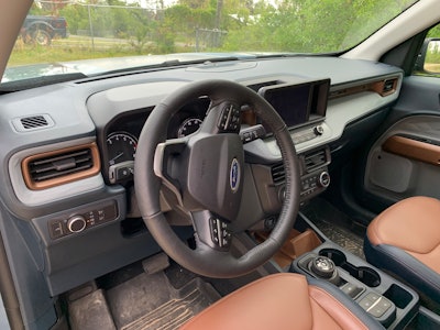 Hop in and go! Don't mind the dirt. Maverick muscled up and went to work during its recent stay in Panama City, Fla. The Maverick Lariat First Edition with Ford Co-Pilot360 and 500A equipment package stickers at $35,800. Desert brown trim with ActiveX seats shown here.