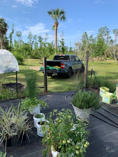 Maverick's compact size makes it easy to drive through the orchard to the garden.