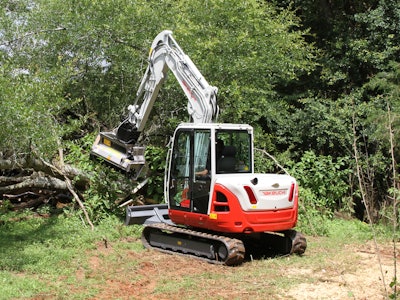 Takeuchi TB210R compact excavator mulching