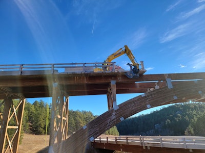 keystone wye bridged demolition excavator over arch
