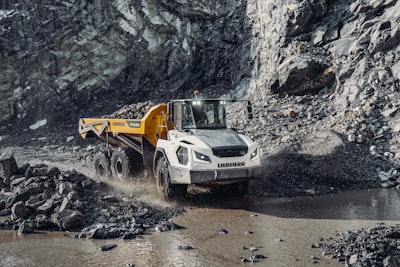 TA 230 Litronic operating in off-road conditions.