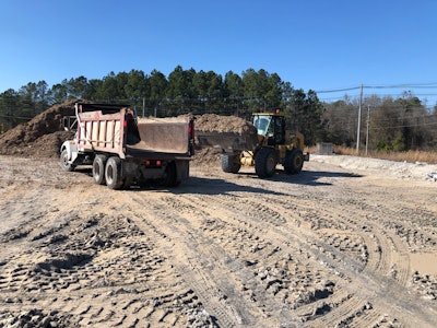 McGraley wheel loader loading dump truck