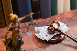 money gavel justice statue stock image