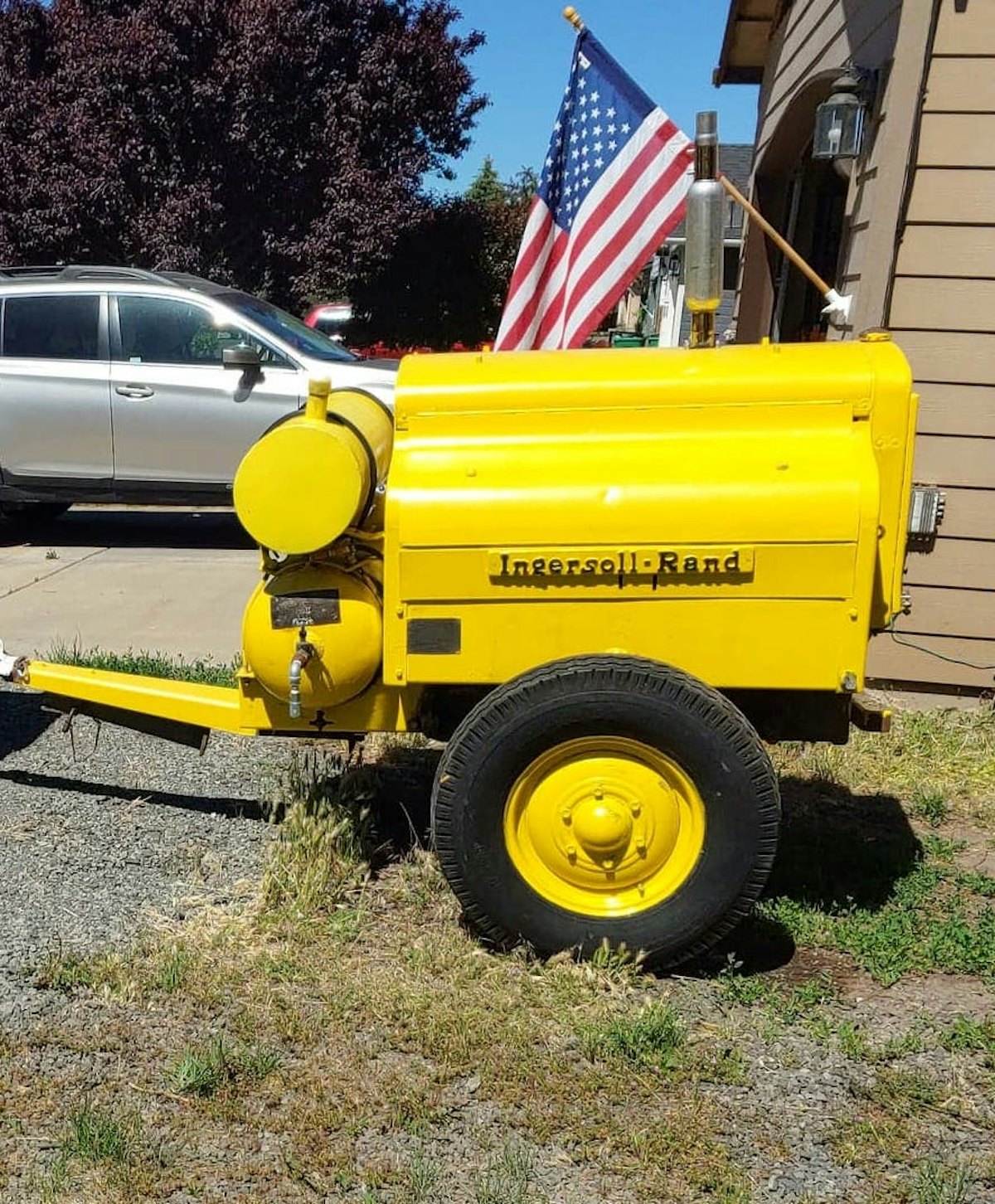 https://img.equipmentworld.com/files/base/randallreilly/all/image/2022/06/1943_Ingersoll_Rand_air_compressor_restored.62bb3aa3b8976.png?auto=format%2Ccompress&fit=max&q=70&w=1200