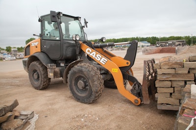 Case 321F compact wheel loader stones on forks