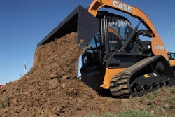 CASE TV370 compact track loader dumping a load of dirt.