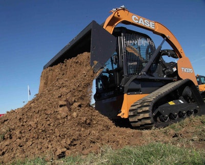 CASE TV370 compact track loader dumping a load of dirt.
