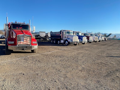 Line-up of trucks at Pilot Rock Excavation