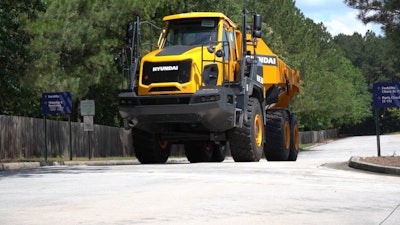 Hyundai HA30 articulated dump truck on paved area