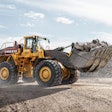 Volvo L350H wheel loader hauling chunks of concrete