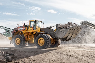 Volvo L350H wheel loader hauling chunks of concrete