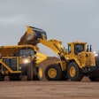 Komatsu HD785-8 Haul Truck being loaded by a wheel loader