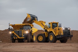 Komatsu HD785-8 Haul Truck being loaded by a wheel loader