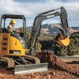 John Deere’s 30G compact excavator digging a foundation