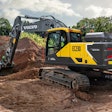 Volvo EC230 E digging at a site