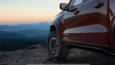 GMC Canyon AT4X sneak peak of driver side doors front wheel