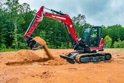 Yanmar SV100-2A mini excavator scooping dirt