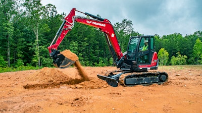 Yanmar SV100-2A mini excavator scooping dirt