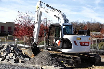 Bobcat E145 excavator by concrete rubble