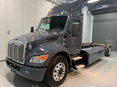 Gray Peterbilt Model 537 in garage with no trailer