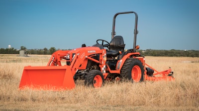 A Kubota utility tractor in a field