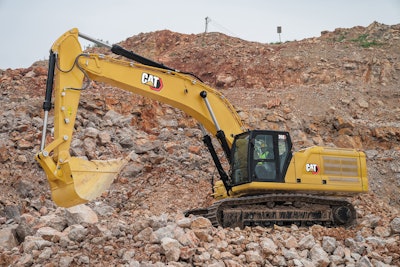 Cat 350 side view on rocks