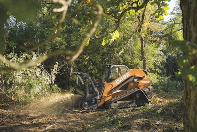 Case TV620B compact track loader in woods mulching brush