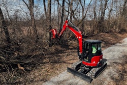 Fecon FMX28 Bull Hog Mulcher attachment on a compact excavator