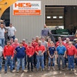 Holland Equipment Services employees standing in front of Hyundai Construction Equipment