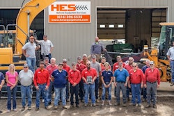 Holland Equipment Services employees standing in front of Hyundai Construction Equipment