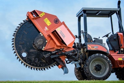 Hydrawheel rock saw attachment on a Ditch Witch RT80 tractor