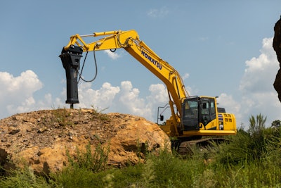 Komatsu excavator with breaker attachment