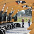 Rows of Caterpillar excavators at auction