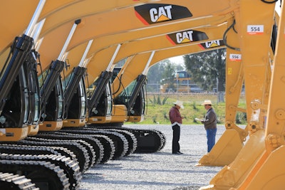 Rows of Caterpillar excavators at auction