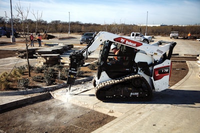 bobcat t76 compact track loader nitrogen hammer breaking concrete parking lot