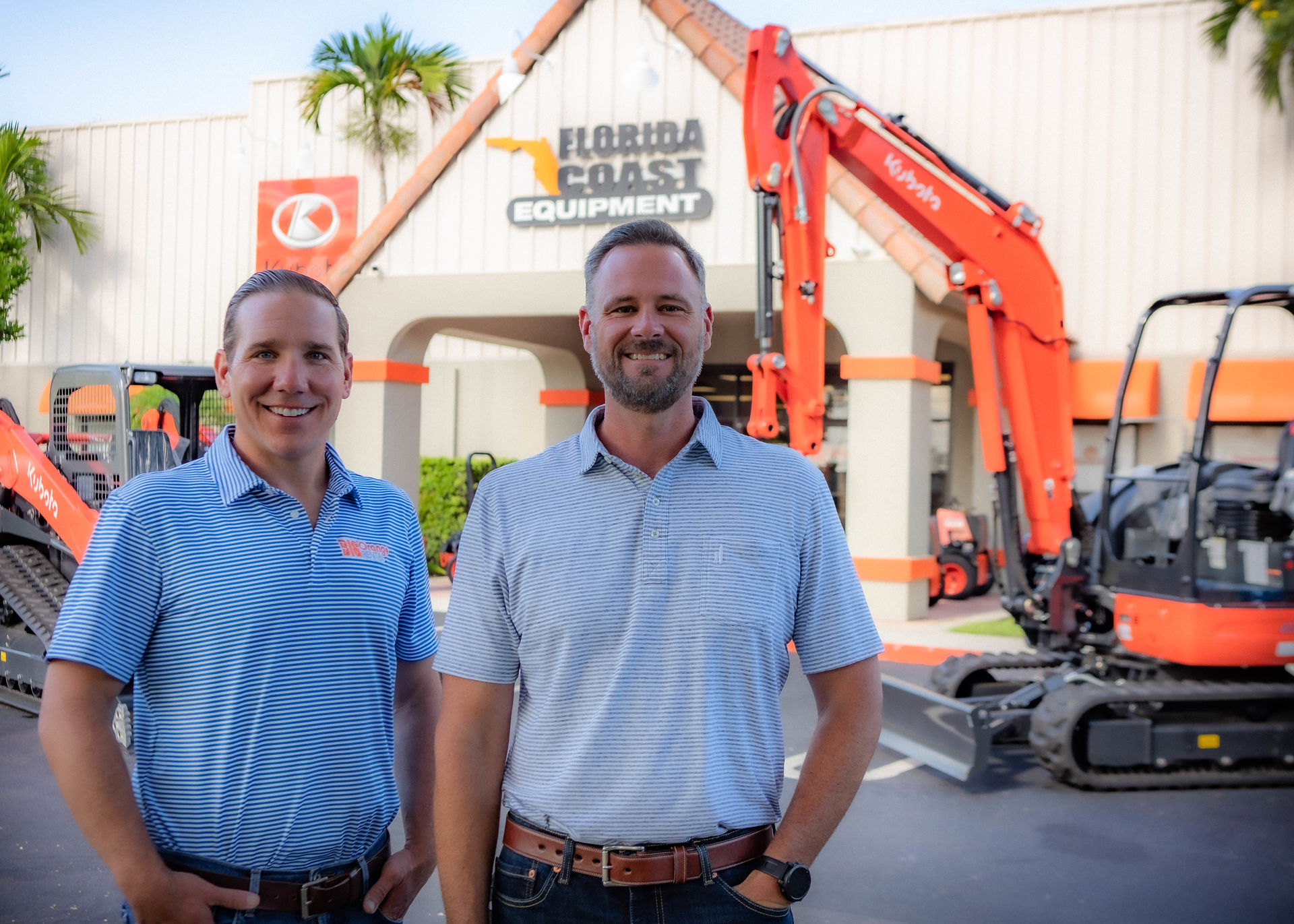 President and CEO Todd Bachman and executive vice president Jason Watson standing in front of Florida Coast Equipment
