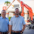 President and CEO Todd Bachman and executive vice president Jason Watson standing in front of Florida Coast Equipment