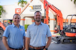 President and CEO Todd Bachman and executive vice president Jason Watson standing in front of Florida Coast Equipment
