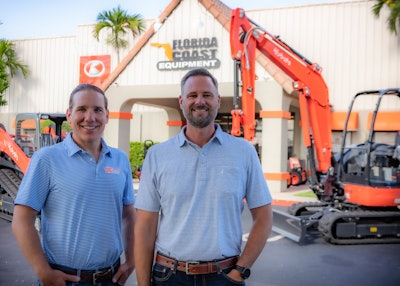 President and CEO Todd Bachman and executive vice president Jason Watson standing in front of Florida Coast Equipment