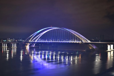 new I-74 mississippi river bridge between iowa illinois illuminated at night
