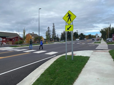 Minnesota DOT Trunk Highway 61 Grand Marais Reconstruction Project pedestrians cross street at intersection