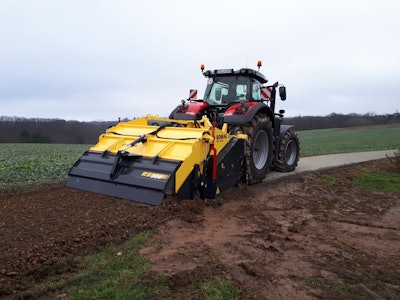Bomag RS 300 soil stabilizer pulled behind tractor