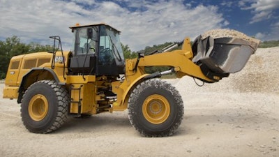 Caterpillar 950 GC Electric Wheel Loader carrying a bucket of aggregate