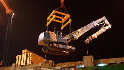 XCMG electric excavator being hoisted