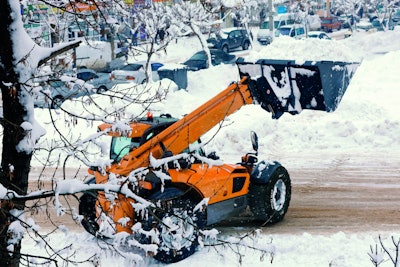 BKT Multimax MP 538 tires on orange telehander operating in snow