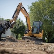 Cat 306 Mini Excavator with a TRS6 tiltrotator