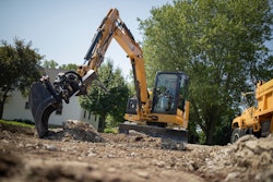 Cat 306 Mini Excavator with a TRS6 tiltrotator