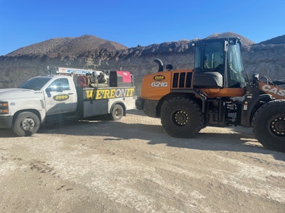 ASCO service truck next to a Case 621G wheel loader